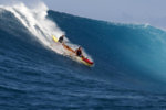 canoe-surfing-at-peahi-maui-darrell-wong.jpg