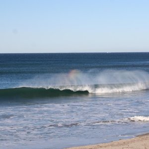 Rainbow in the Wave Photo Laura Holman